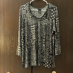 Citiknits dark green top with tan design. Size Large.